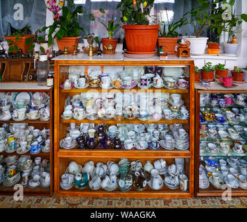 Porcelain teacups on display in Predeal is a mountain resort town in Brasov County, Romania. Stock Photo