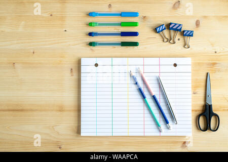 Group of stationary office supplies on wooden table Stock Photo