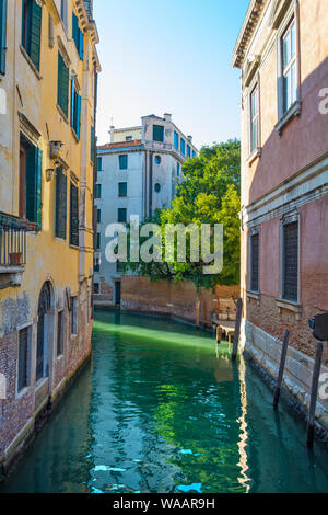 Venice, Italy - Sep 30, 2018: Picturesque view of Venice with famous water canal and colorful houses. Splendid morning scene in Italy, Europe. Stock Photo