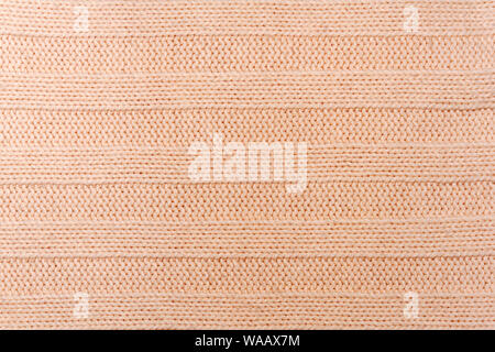 Background, texture - the surface of wool knitted fabric close up Stock Photo