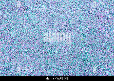 background of children's plasticine crumbs of blue and purple, copy space Stock Photo