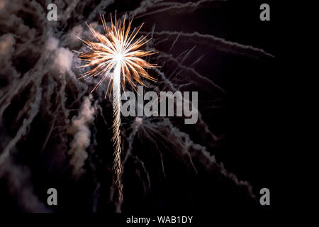 A photo of fireworks lighting up the sky with room for copy at the Up Helly Aa festival in Lerwick, Shetland on a cold winter's night Stock Photo