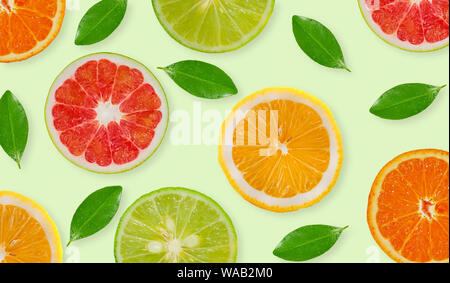 Variety of whole and sliced citrus fruits , lemon, lime,grapefruit and orange Stock Photo