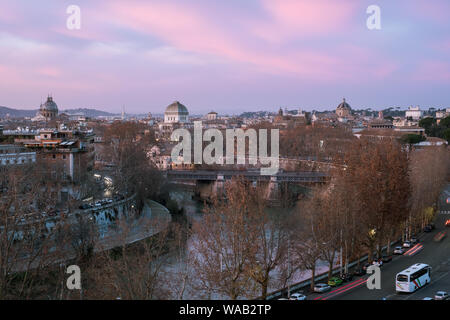 The sunset city view from Giardino degli Aranci in Rome, Italy Stock Photo