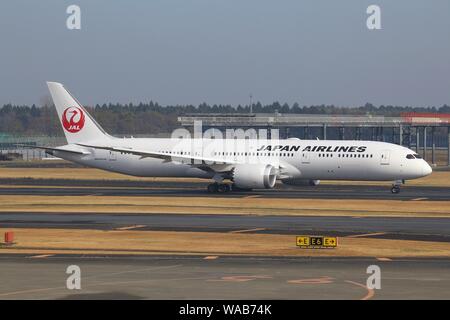 TOKYO, JAPAN - DECEMBER 5, 2016: Japan Airlines Boeing 787 taxiing at Narita Airport of Tokyo. The airport is the 2nd busiest airport of Japan (after Stock Photo