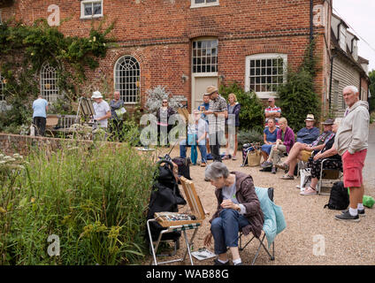 Artists painting at the National Trust's Flatford Mill made famous by the artist John Constable 1776 -1837,  Suffolk, England, UK Stock Photo