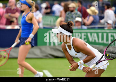 Heather Watson (GBR) playing doubles with Harriet Dart (GBR) at the Nature Valley International tennis, Devonshire Park, Eastbourne, England, UK. 25th Stock Photo
