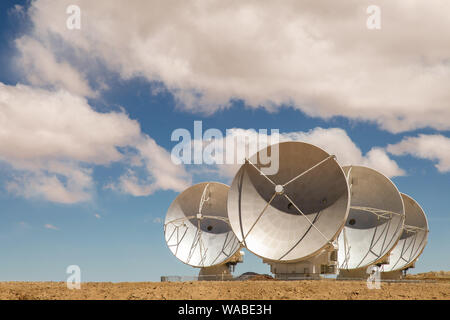 Radio satellite dishes pointed to the sky Stock Photo
