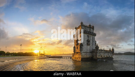 Lisbon Portugal sunrise panorama city skyline at Belem Tower and Tagus River Stock Photo