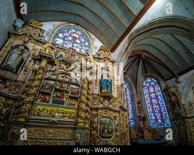 Ornate altar piece  of Notre-Dame de Lampaul-Guimiliau church, Finistere department, Bretagne, France Stock Photo