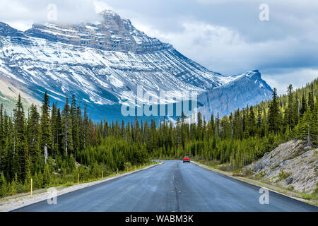 Icefields Parkway at Cirrus Mountain - A Spring evening view of Icefields Parkway at base of Cirrus Mountain, Banff National Park, Alberta, Canada. Stock Photo