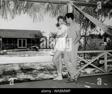 Lucille Ball and husband Desi Arnaz at their home in Chatsworth, California, (circa 1942)   File Reference # 33848-418THA Stock Photo