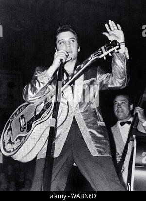 Elvis Presley performing in his Gold Lame jacket, 1957  File Reference # 33848-163THA Stock Photo