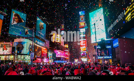 New York City, USA, January 1, 2015, Atmospheric new year's eve celebration on famous times square intersection after midnight with countless happy pe Stock Photo