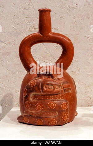 Yekaterinburg, Russia - January 17, 2019: ancient Peruvian ceramic vessel with a serpent, Cupisnique culture, 1200-200 BC Stock Photo