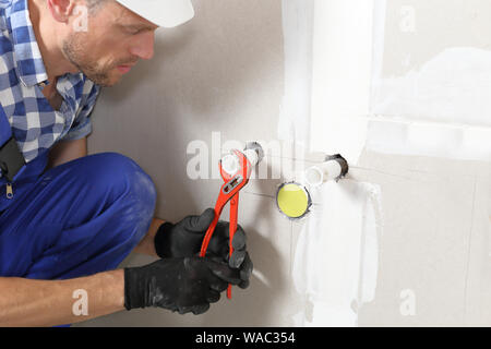 Installling of a water connection in new building Stock Photo