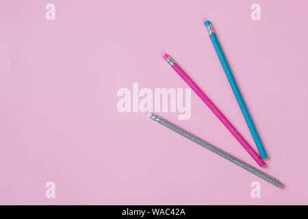 Colorful pencils, isolated. background from color pencils on green paper Stock Photo
