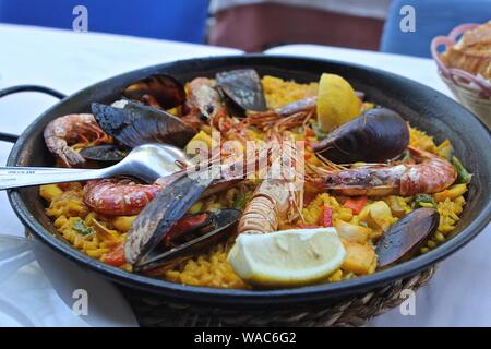 Paella Seafood in Barcelona Spain Spanish traditional cooking by the beach in Barcelona Spain Stock Photo