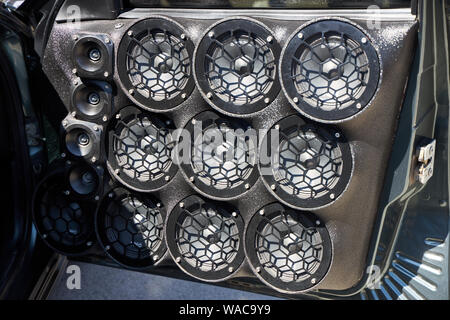 ROSTOV-ON-DON, RUSSIA, APRIL 21, 2019: Many round acoustic speakers are integrated in the front door of the tuned car Stock Photo