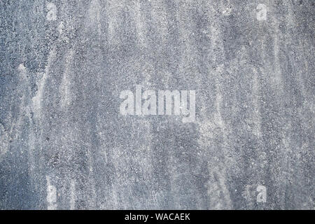 urban background - surface of dirty asphalt road Stock Photo