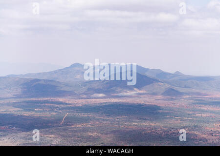 Hills of the Rift Valley from Ngong Hills Nature Reserve in dappled sunlight, Kenya Stock Photo