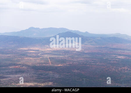 Hills of the Rift Valley from Ngong Hills Nature Reserve in dappled sunlight, Kenya Stock Photo