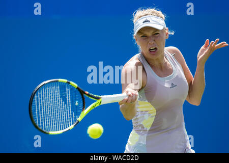 Caroline Wozniacki of Denmark playing single handed forehand against Alize Cornet of France at Aegon International 2016, Eastbourne, England - Sunday, Stock Photo