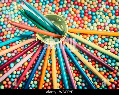 top view of multicolored pencils on balls background Stock Photo