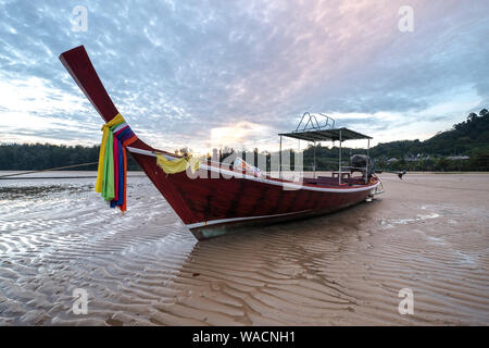 Dusk and a long-tail boat, Phuket Stock Photo