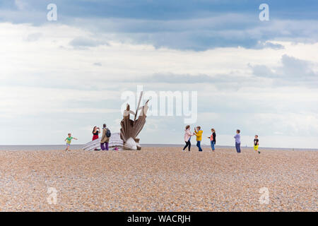 Sculpture called Scallop, dedicated to Benjamin Britten on the beach at the seaside town of Aldeburgh on the East Suffolk coast, England, UK Stock Photo