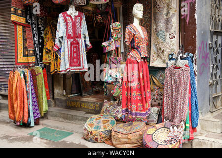 Indian clothing and handicrafts displayed in shop, Thamel district of Kathmandu, Nepal Stock Photo