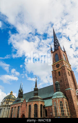 Riddarholmen medieval monastery church with black wrought iron spires, Gamla Stan, Stockholm Sweden, Europe Stock Photo