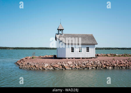 traditional Scandinavian house on the end of pier at sea in summer Stock Photo