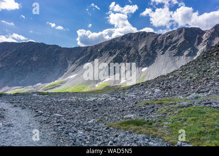 Talus and broken rocks line alpine trail up to Gray's Peak, Colorado Stock Photo