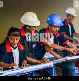 latin students doing project at  college in Guatemala Stock Photo