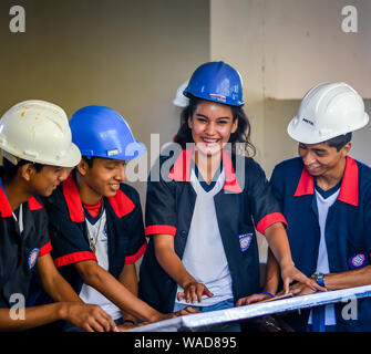 latin students doing project at  college in Guatemala Stock Photo
