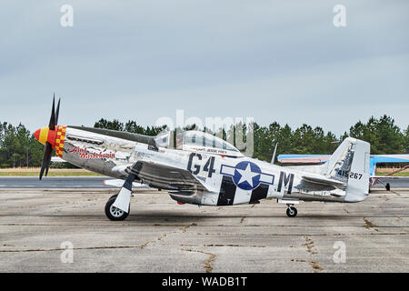 Parked vintage American P 51 Mustang fighter airplane, the Ain't Misbehaven, from WWII era in Bessemer Alabama, USA. Stock Photo