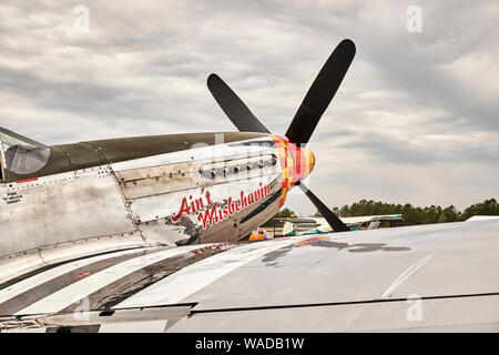 Parked vintage American P 51 Mustang fighter airplane, the Ain't Misbehaven, from WWII era in Bessemer Alabama, USA. Stock Photo