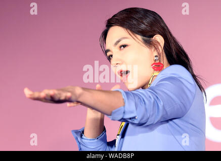 **TAIWAN OUT**Taiwanese singer Ella, or known as Chen Chia-hwa, attends a press conference of Evian, a French brand of mineral water, promoted Evian v Stock Photo