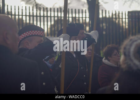 Leicester, United Kingdom - November 11 2018: Woman standing proud during the Remembrance day centenary event in Victoria Park Stock Photo