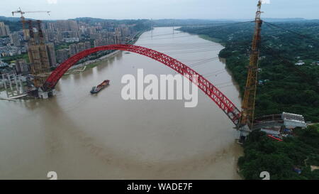 In this aerial view, the closure of main arch of Hejiang Yangtze River Bridge is completed over the Yangtze River in Hejiang county, Luzhou city, sout Stock Photo