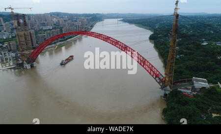 In this aerial view, the closure of main arch of Hejiang Yangtze River Bridge is completed over the Yangtze River in Hejiang county, Luzhou city, sout Stock Photo