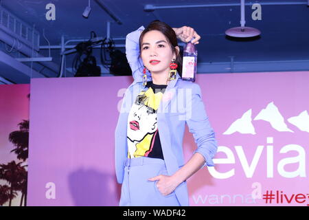 **TAIWAN OUT**Taiwanese singer Ella, or known as Chen Chia-hwa, attends a press conference of Evian, a French brand of mineral water, promoted Evian v Stock Photo