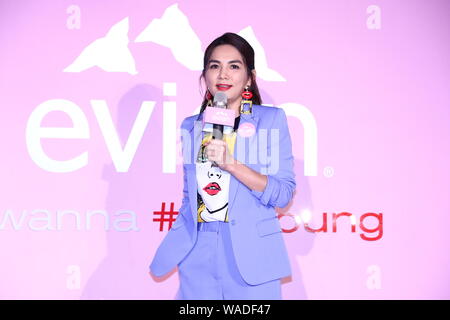 **TAIWAN OUT**Taiwanese singer Ella, or known as Chen Chia-hwa, attends a press conference of Evian, a French brand of mineral water, promoted Evian v Stock Photo