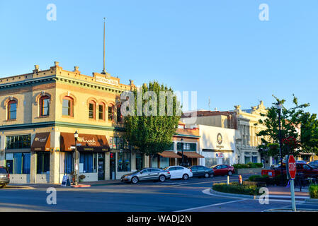 National Building on the corner of Railroad Avenue and 3rd Street, with the California Theatre in the background. Old  town Pittsburg California Stock Photo