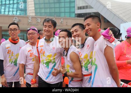 Over 1700 citizens attend the event and of crossing the Pearl Riverenjoy the carnival in Guangzhou, south China¯s Guangdong province, 18 July 2019. Stock Photo