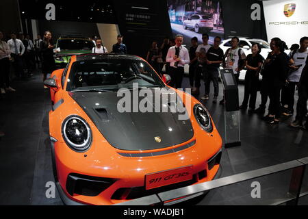 --FILE--A Porsche 911 GT3 RS sports car is displayed during an expo in Kunming city, southwest China's Yunnan province, 27 June 2019.   Having gone th Stock Photo