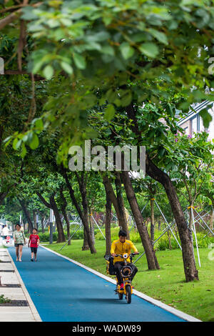 --FILE--The Qiaoxiang Road in Futian and Nanshan districts, which is Shenzhen's first 'smart road,' opens to public in Shenzhen city, south China's Gu Stock Photo