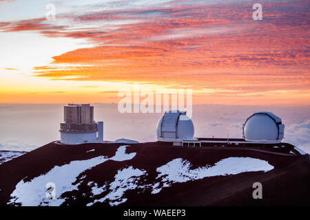 Subaru Telescope and W.M. Keck Observatory at sunset atop the summit of Mauna Kea, Hawaii Stock Photo