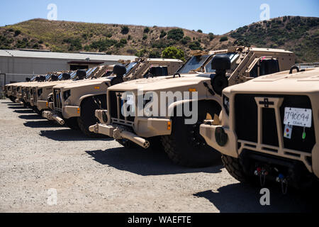 https://l450v.alamy.com/450v/waefte/a-series-of-joint-light-tactical-vehicles-wait-in-a-staging-area-in-22-area-to-be-distributed-to-various-units-on-marine-corps-base-camp-pendleton-california-aug-19-2019-the-jltv-is-a-more-ruggedized-and-survivable-vehicle-set-to-replace-the-army-and-marine-corps-humvees-the-marine-corps-first-fielded-the-jltv-at-the-school-of-infantry-west-mcb-camp-pendleton-and-will-eventually-replace-its-entire-humvee-fleet-with-approximately-15000-jltvs-us-marine-corps-photo-by-lance-cpl-alison-dostie-waefte.jpg